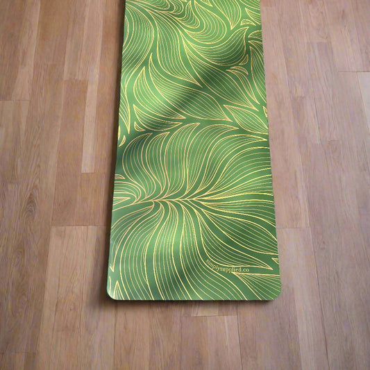 Green patterned mat on a wooden floor
